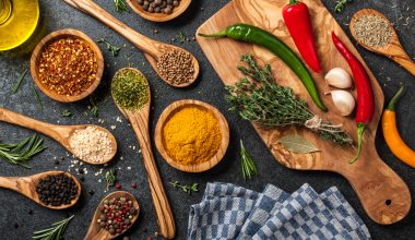 Cooking table with spices and herbs